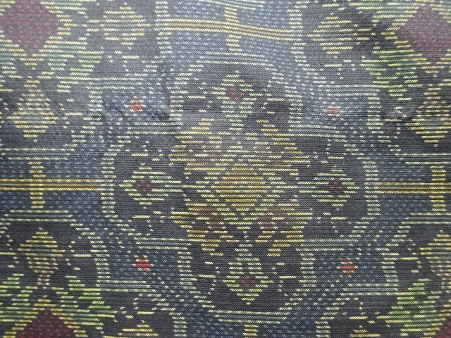 アンティーク　華紋模様織出し本場泥大島紬着物